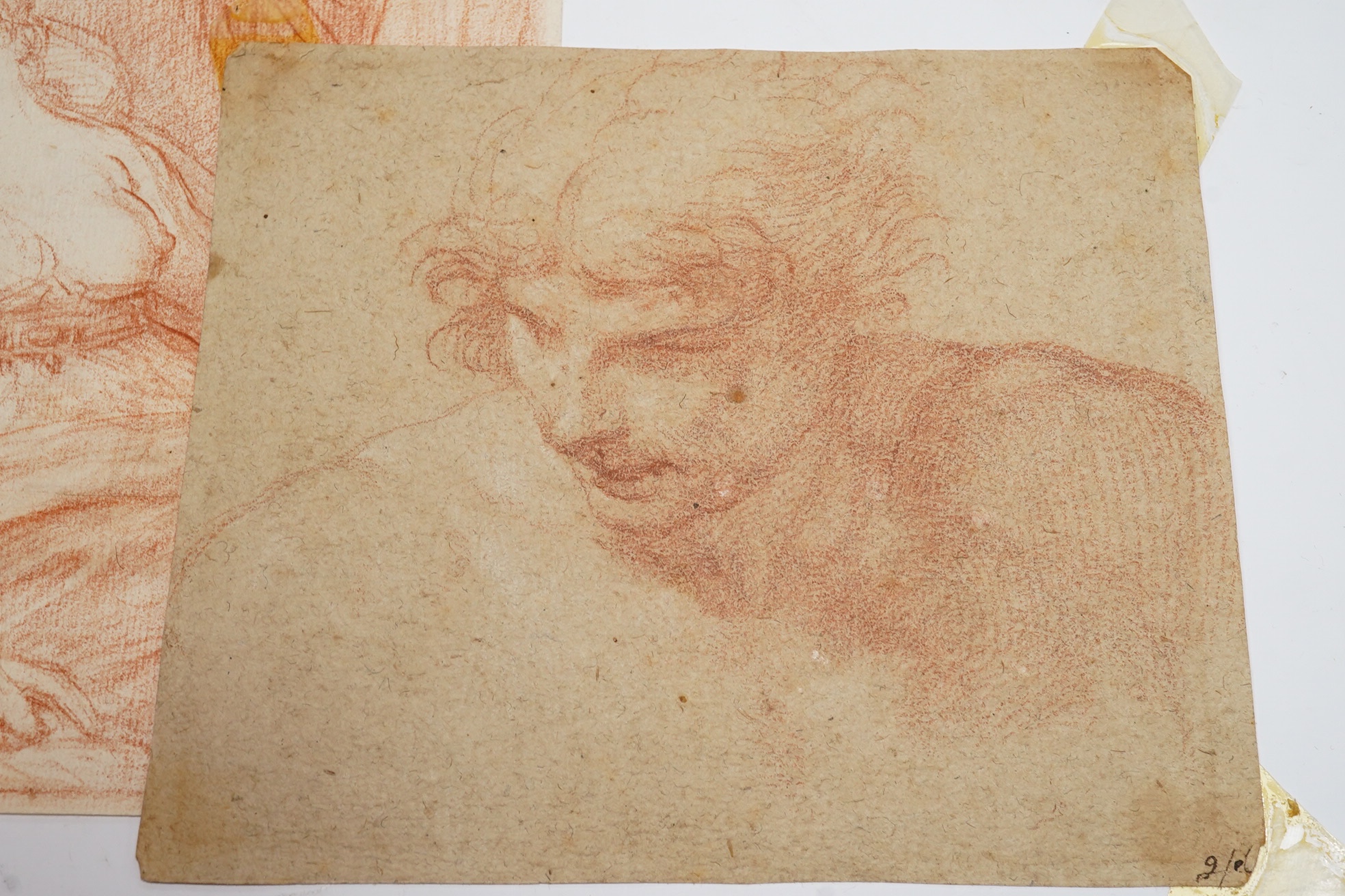 Four Old Master sanguine chalk and watercolours on buff paper, including figure tying a shoe, Putti and a study of a semi-nude reclining woman, largest 17.5 x 23cm, unframed. Condition - fair, considering age